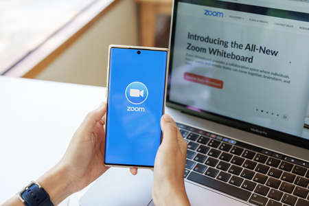 Chiangmai, Thailand - 13 May 2022: Popular Zoom video conference app icon on a mobile device.