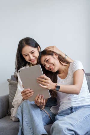 lgbtq, lgbt concept, homosexuality, portrait of two asian women enjoying together and showing love...
