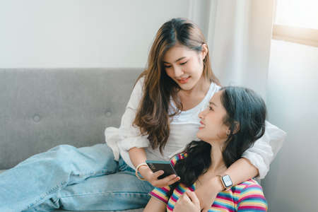 lgbtq, lgbt concept, homosexuality, portrait of two asian women enjoying together and showing love...