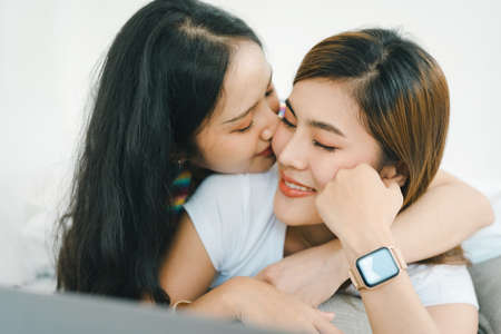 lgbtq, lgbt concept, homosexuality, portrait of two Asian women posing happy together and showing...
