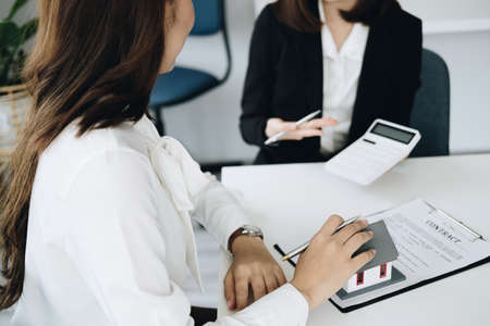 Guarantee, mortgage, contract, contract, signed, real estate agent or bank officer holding a...