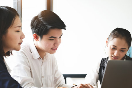 Start-up Business, a team of young entrepreneurs working together to increase profits into the company to increase business potentialの写真素材