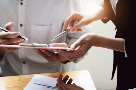 Start-up Business, a team of young entrepreneurs working together to increase profits into the...