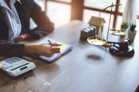 Portrait of a female lawyer, African Americans working at the office to study the case before litigation with the partiesの写真素材