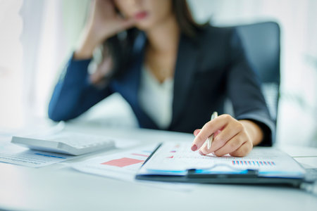 Concept Burnout Syndrome. Business Woman feels uncomfortable working. Which is caused by stress, accumulated from unsuccessful work And less resting body. Consult a specialist psychiatristの写真素材