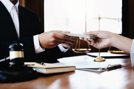 Fraudulent payment between lawyer and client.の写真素材