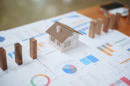 Model house and wooden stick, insurance concept.の写真素材