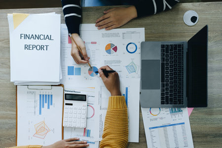 Asian entrepreneurs and business people meeting in a conference room in business planning, financial budget and investment risk assessment to analyze customer groups to increase company growth.の写真素材