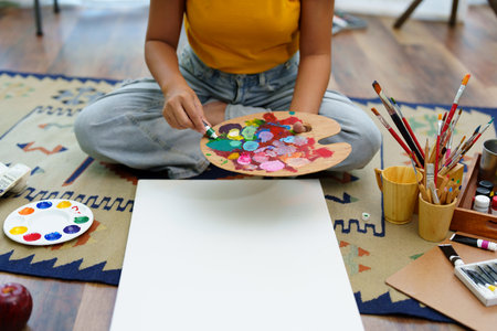 Portrait of an Asian woman designing art in her spare timeの写真素材