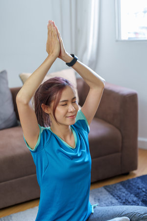 stress relief, muscle relaxation, breathing exercises, exercise, meditation, portrait of Young Asian...