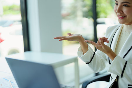 women marketing offering products to customers in order to make a profit for the company..の写真素材