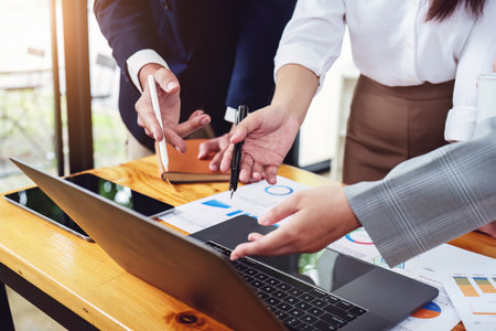 Planning to reduce investment risks, the image of a group of businesspeople working with partners is...