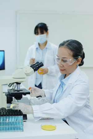medical research laboratories, scientists analyze chemical samples Discuss technological...