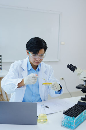 medical research laboratories, scientists analyze chemical samples Discuss technological innovations. Advanced scientific laboratories for medicine, biotechnologyの写真素材
