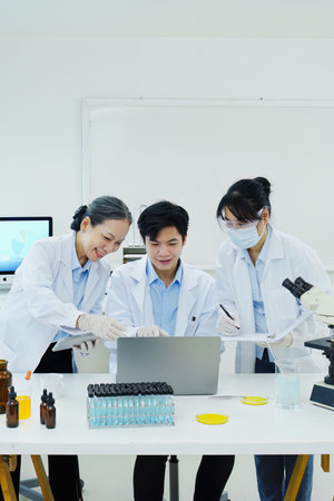 medical research laboratories, scientists analyze chemical samples Discuss technological innovations. Advanced scientific laboratories for medicine, biotechnologyの写真素材