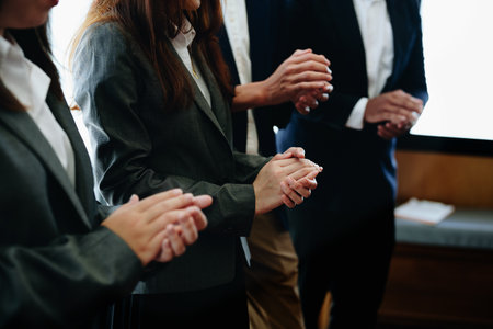 The companys business group congratulated by applauding the number one sales figure this year.