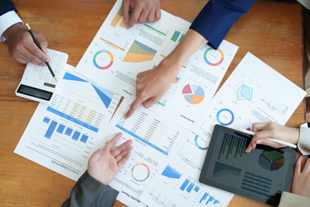 business group people meeting and discuss, plan financial budgets for investments, planning new marketing strategies to fight with competitors.の写真素材