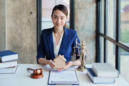 Law, Consultation, Agreement, Contract, Concept Attorney or Lawyer is sitting and accepting complaints from clients for home and land matters in courtの写真素材