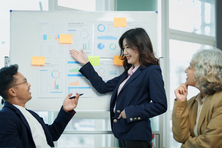 Asian entrepreneurs and business people meeting in a conference room in business planning, financial budget and investment risk assessment to analyze customer groups to increase company growth.の写真素材