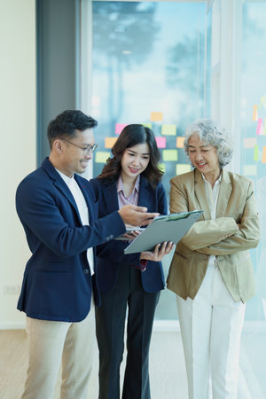 Asian entrepreneurs and business people meeting in a conference room in business planning, financial budget and investment risk assessment to analyze customer groups to increase company growth.の写真素材