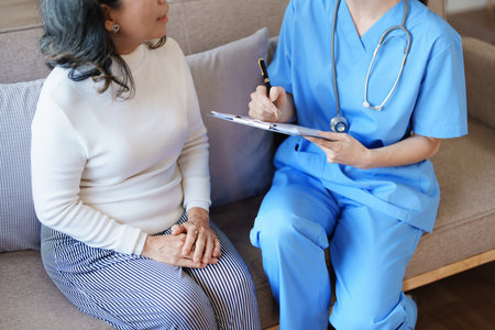 Portrait of a female doctor holding a patient clipboard to discuss and analyze the patients condition before treatingの写真素材