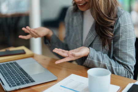 Business work and planning, portrait of a businesswoman using a computer in a meeting.