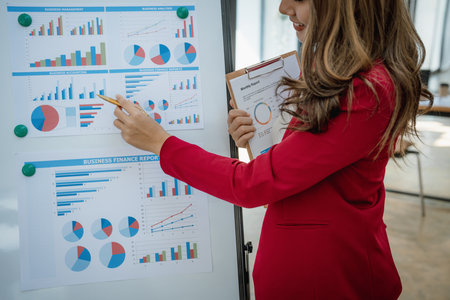 Portrait young business woman presentation marketing profit with confident within investment and seminar for planning of finance.の写真素材