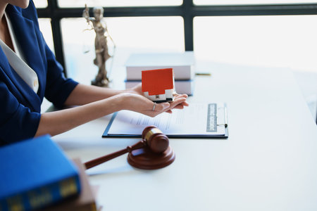 Law, Consultation, Agreement, Contract, Concept Attorney or Lawyer is sitting and accepting complaints from clients for home and land matters in courtの写真素材