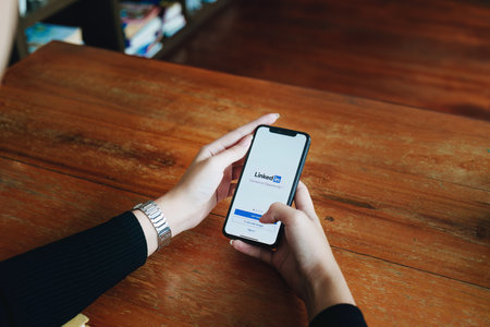CHIANG MAI, THAILAND - JUN 29, 2022: iPhone X with LinkedIn application on the screen. LinkedIn is a business-oriented social networking service.のeditorial素材
