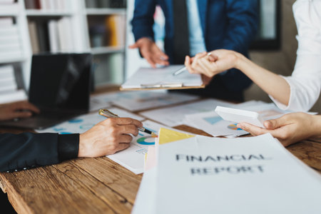 startup Asian business advisor meeting to analyze and discuss the situation on the financial report in the meeting room.Investment Consultant, Financial , teamwork ,brainstorming and accountingの写真素材