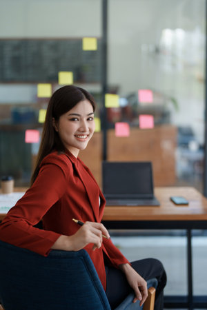 Business, finance and employment, female successful entrepreneurs concept. Confident smiling asian businesswoman, using laptop at workの写真素材