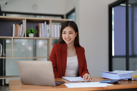 planning, auditing, business planning, finance, young asian business woman working on computer and checking investment documents and planning marketing to increase profit, business conceptsの写真素材