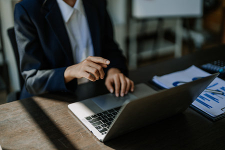 planning, auditing, business planning, finance, young asian business woman working on computer and checking investment documents and planning marketing to increase profit, business conceptsの写真素材