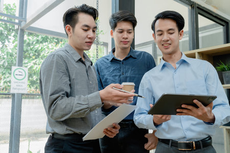 startup business, business team planning teamwork paperwork audit and discussing marketing, profit, budget of company in meeting roomの写真素材