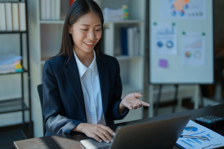 planning, auditing, business planning, finance, young asian business woman working on computer and checking investment documents and planning marketing to increase profit, business conceptsの写真素材