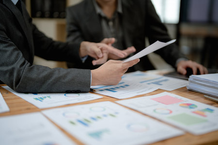 startup Asian business advisor meeting to analyze and discuss the situation on the financial report in the meeting room.Investment Consultant, Financialの写真素材