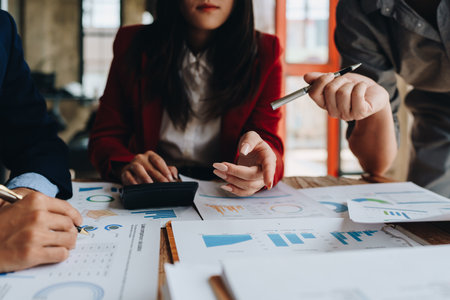 startup Asian business advisor meeting to analyze and discuss the situation on the financial report in the meeting room.Investment Consultant,の写真素材