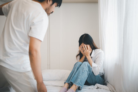 Domestic violence and Family conflict concept, father fighting mother with quarrel at homeの写真素材