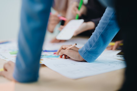 Team of Creative Web, Graphic Designer planning for mobile phone, drawing website ux ui app for mobile phone application and development template layout, process to developing prototype wireframeの写真素材