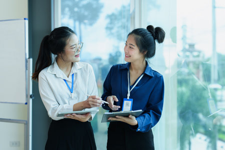startup business, business advisor explaining strategy for planning finance investment teamwork paperwork audit and discussing marketing, profit, budget of company in meeting roomの写真素材
