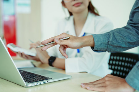 startup business, business advisor strategy for planning finance investment teamwork paperwork audit and discussing marketing, profit, budget of company in meeting room, stock market chart conceptsの写真素材