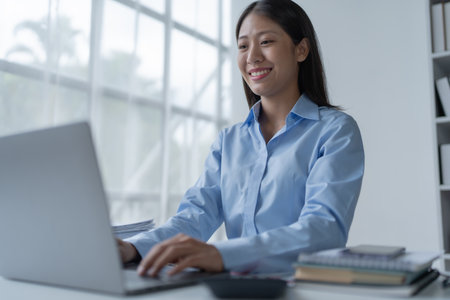 business woman using computer laptop meetings conference to plan a marketing strategy for finance meeting aiming to align financial goals with market opportunities.の写真素材