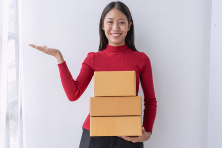 woman, online seller, efficiently manages customer orders and delivery through the e-commerce...