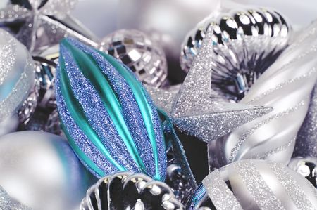 Silver and Blue Christmas Ornaments of different shapes.の写真素材