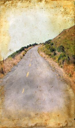 Winding road on grunge background. Lots of copy-space for your text.の写真素材