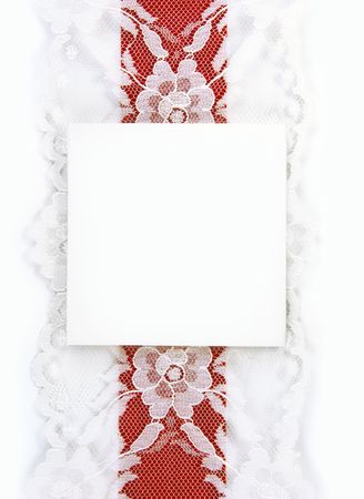 Blank gift card with red and lace ribbon.の写真素材