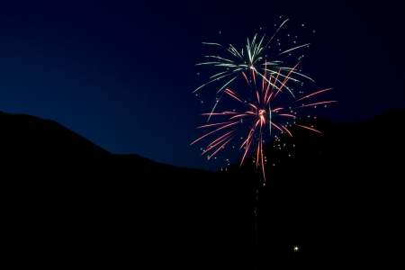 Fireworks Against Mountain Sky