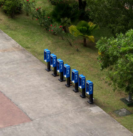 A grouping of empty blue pay phone boothsの写真素材