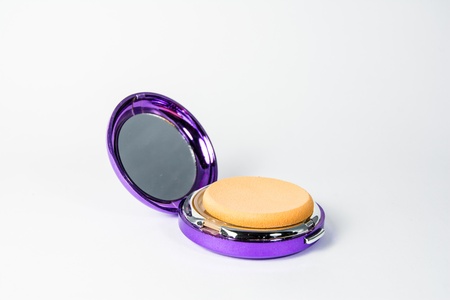 purple powder puff isolated on white backgroundsの写真素材