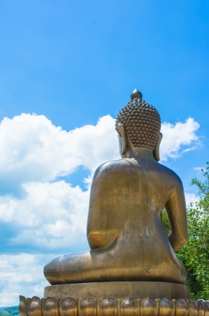 back view big Buddha statue of thailand on natural backgroundsの写真素材